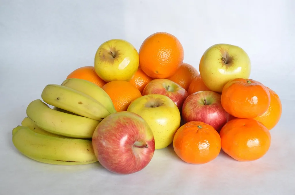 Mélange de fruits : pomme banane orange